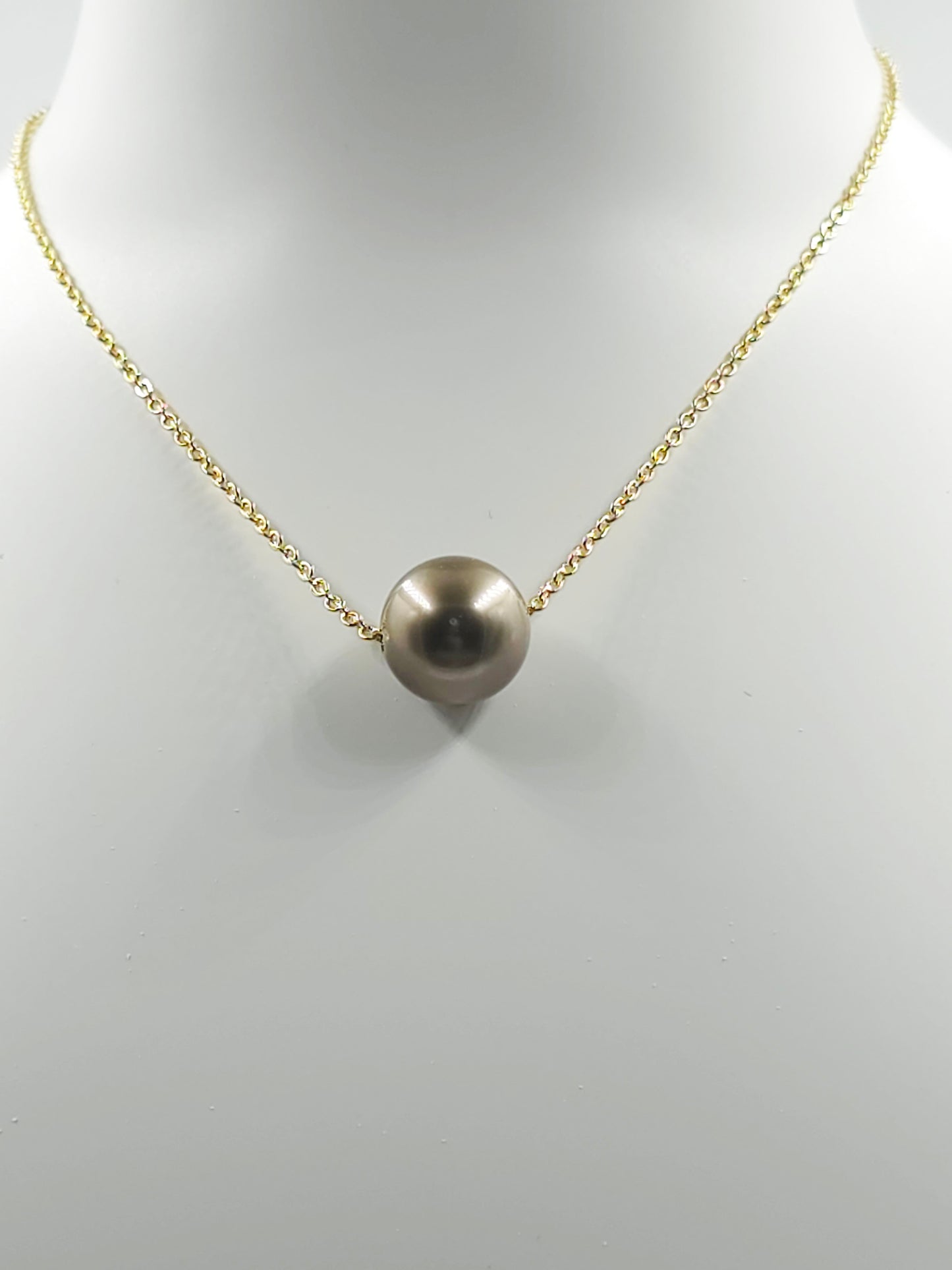 Collier flottant en plaqué or 14 carats — « Le Flotteur »