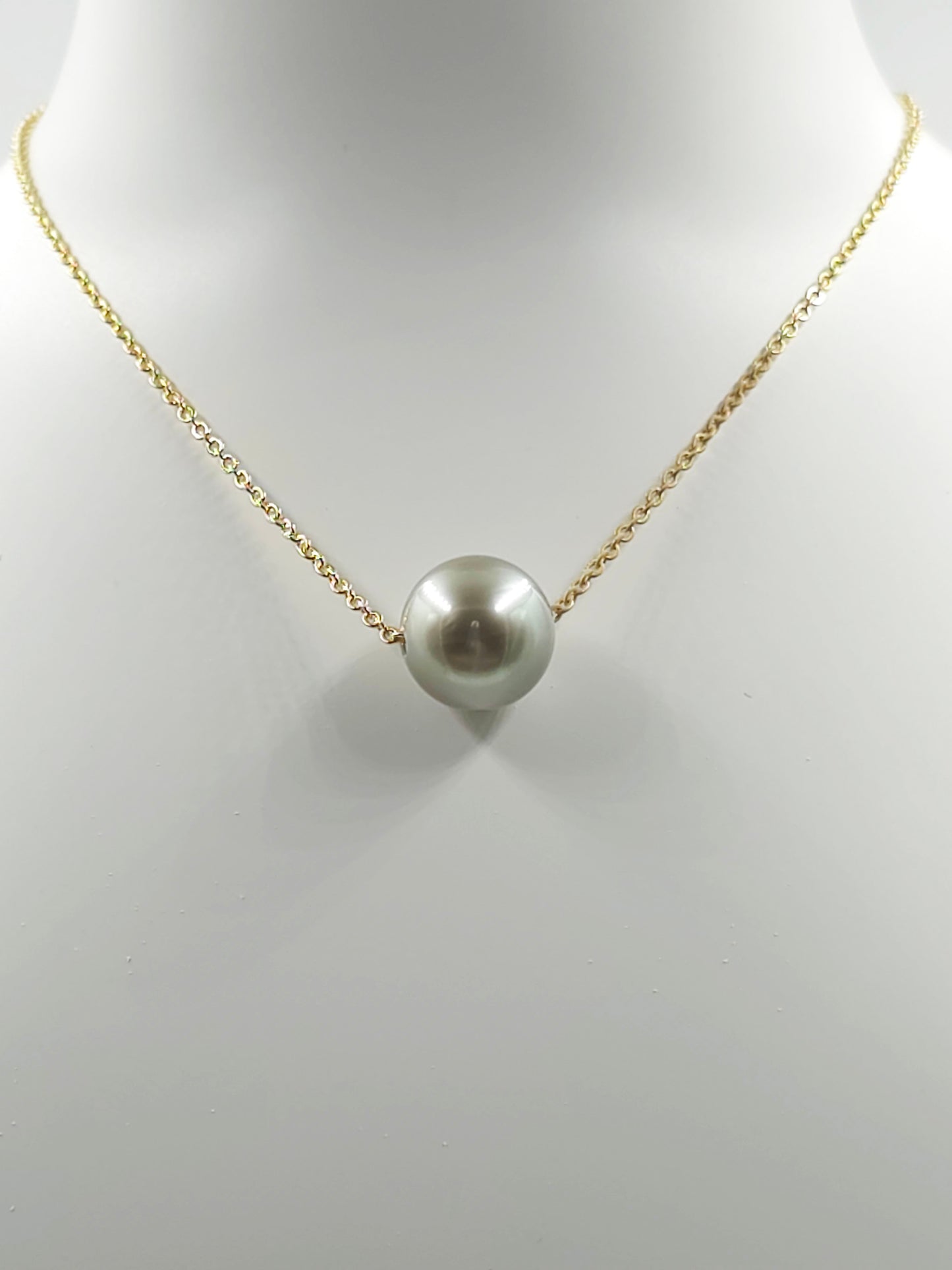 Collier flottant en plaqué or 14 carats — « Le Flotteur »