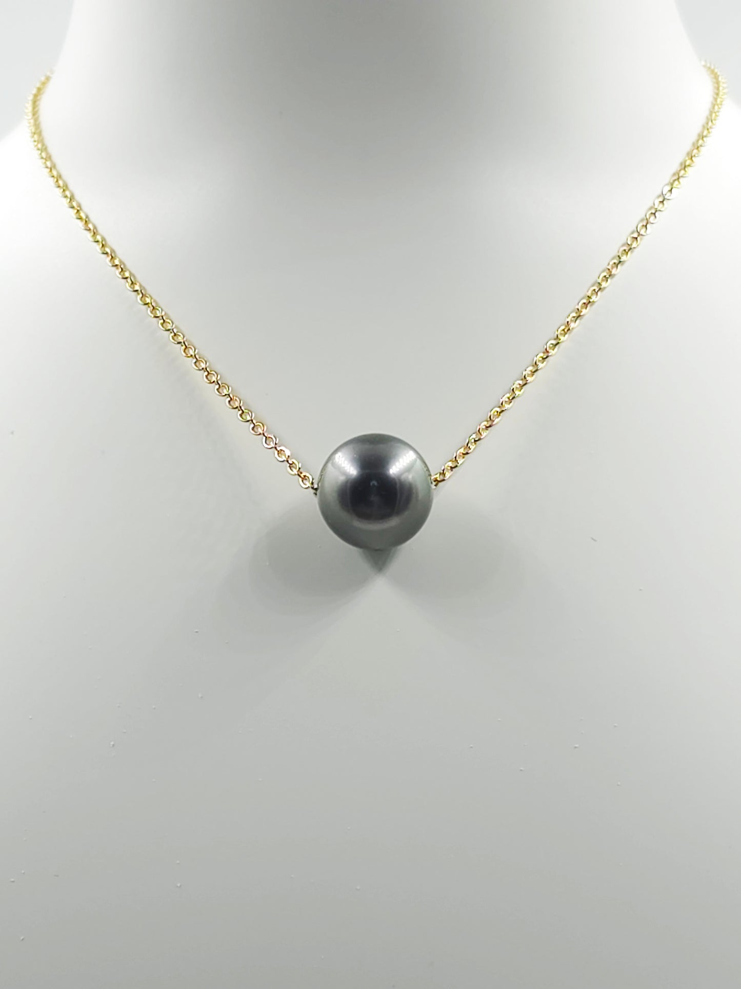 Collier flottant en plaqué or 14 carats — « Le Flotteur »