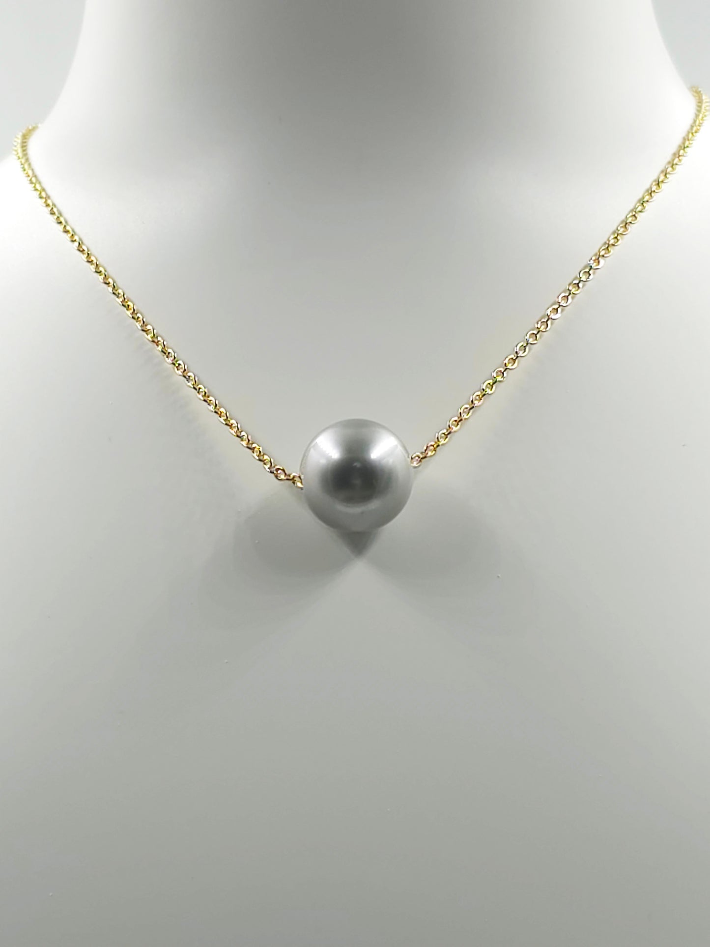 Collier flottant en plaqué or 14 carats — « Le Flotteur »