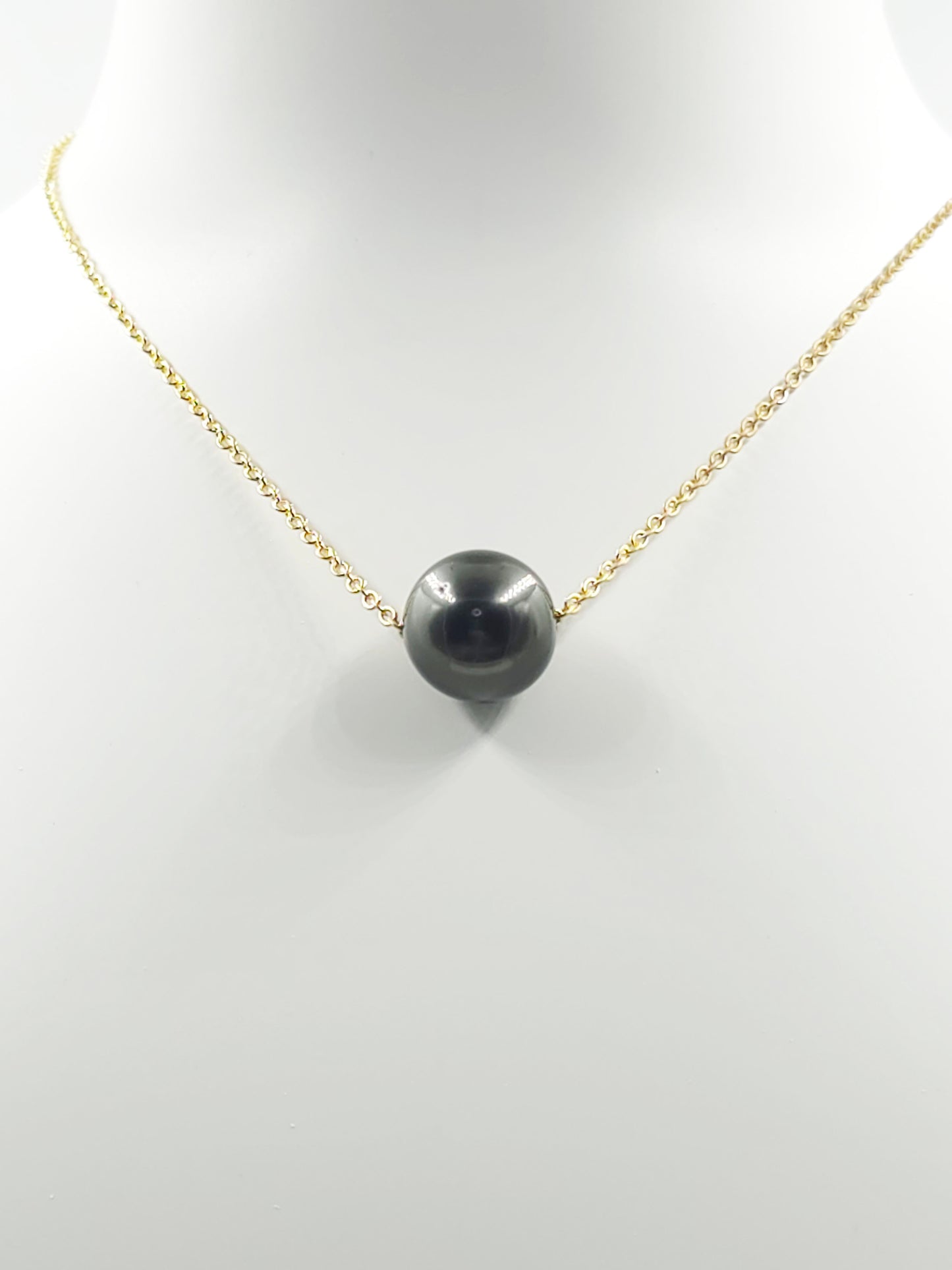 Collier flottant en plaqué or 14 carats — « Le Flotteur »