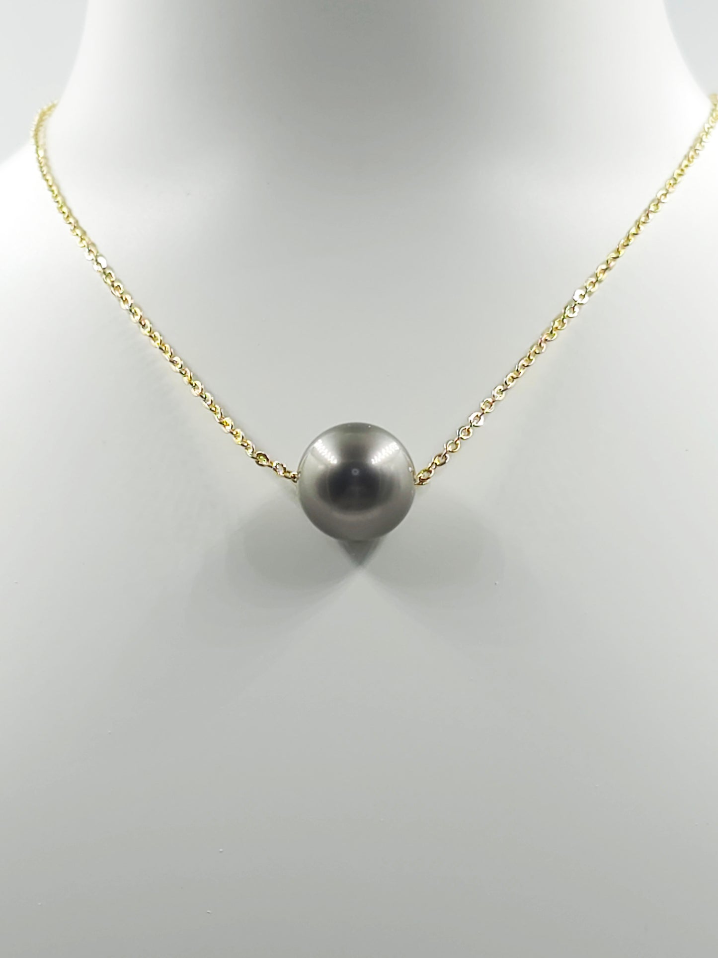 Collier flottant en plaqué or 14 carats — « Le Flotteur »