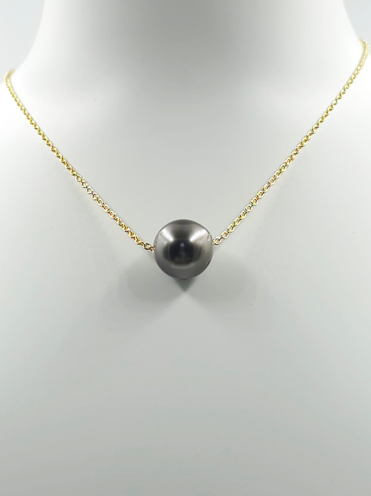 Collier flottant en plaqué or 14 carats — « Le Flotteur »