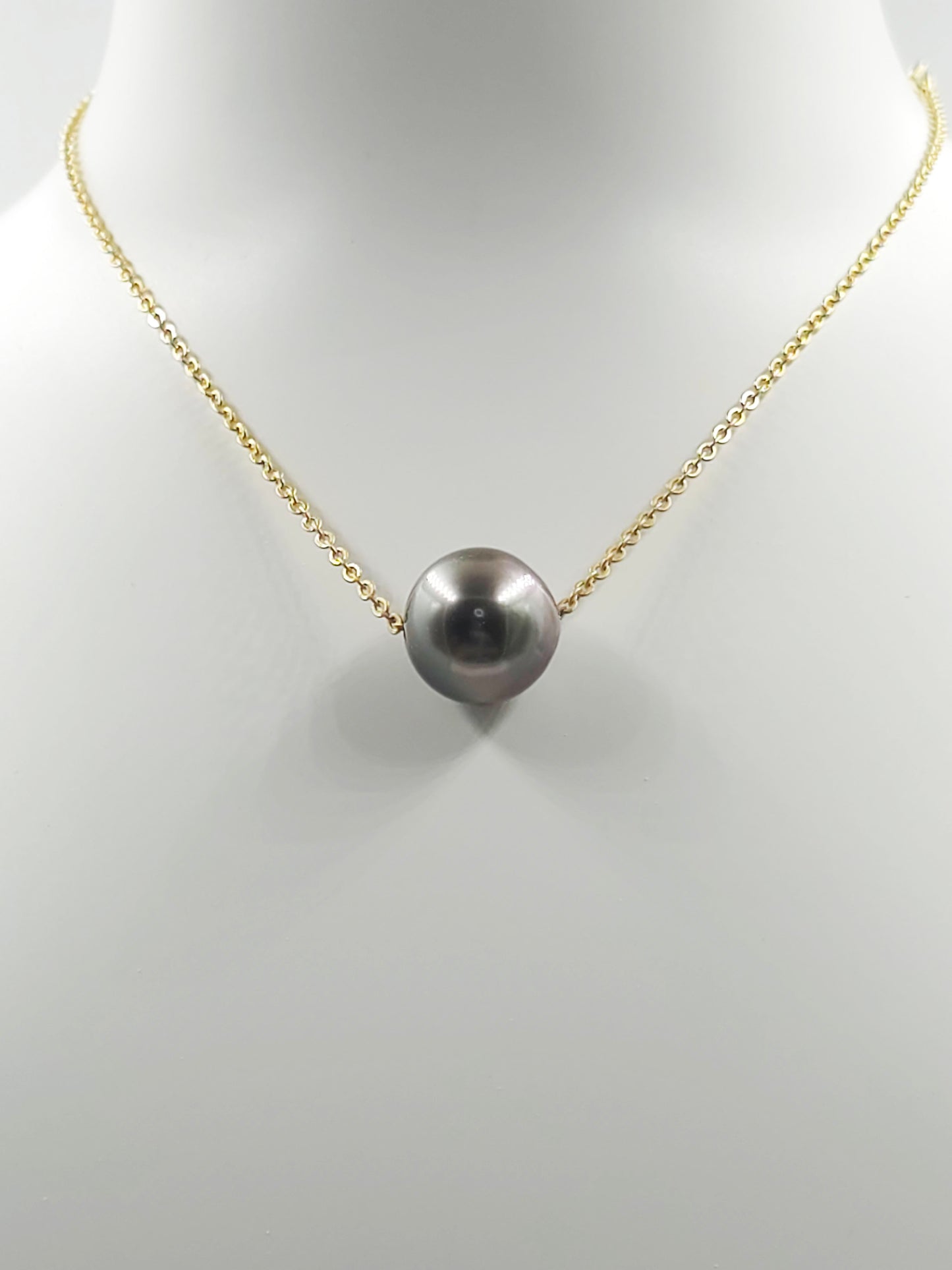 Collier flottant en plaqué or 14 carats — « Le Flotteur »