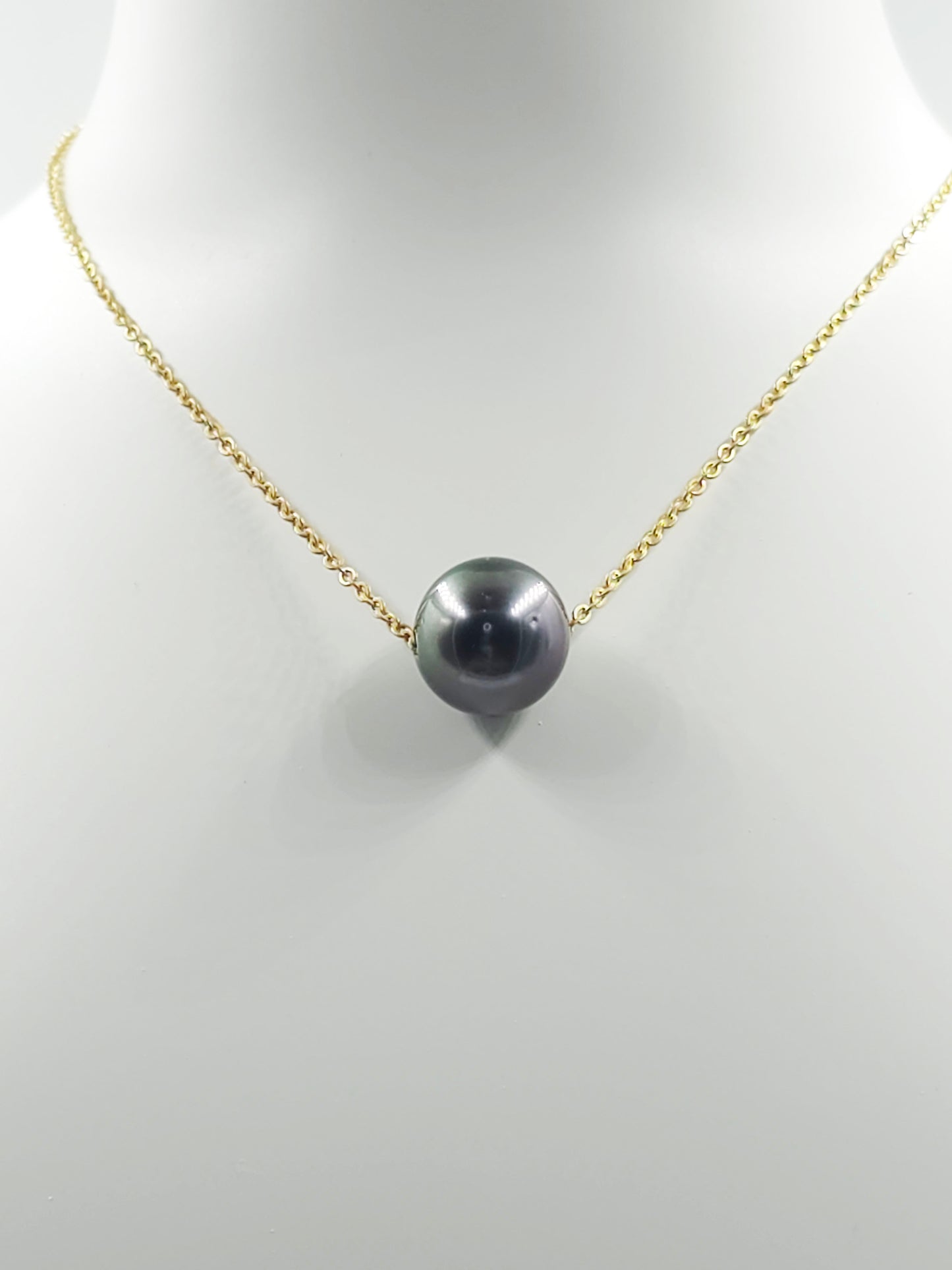 Collier flottant en plaqué or 14 carats — « Le Flotteur »
