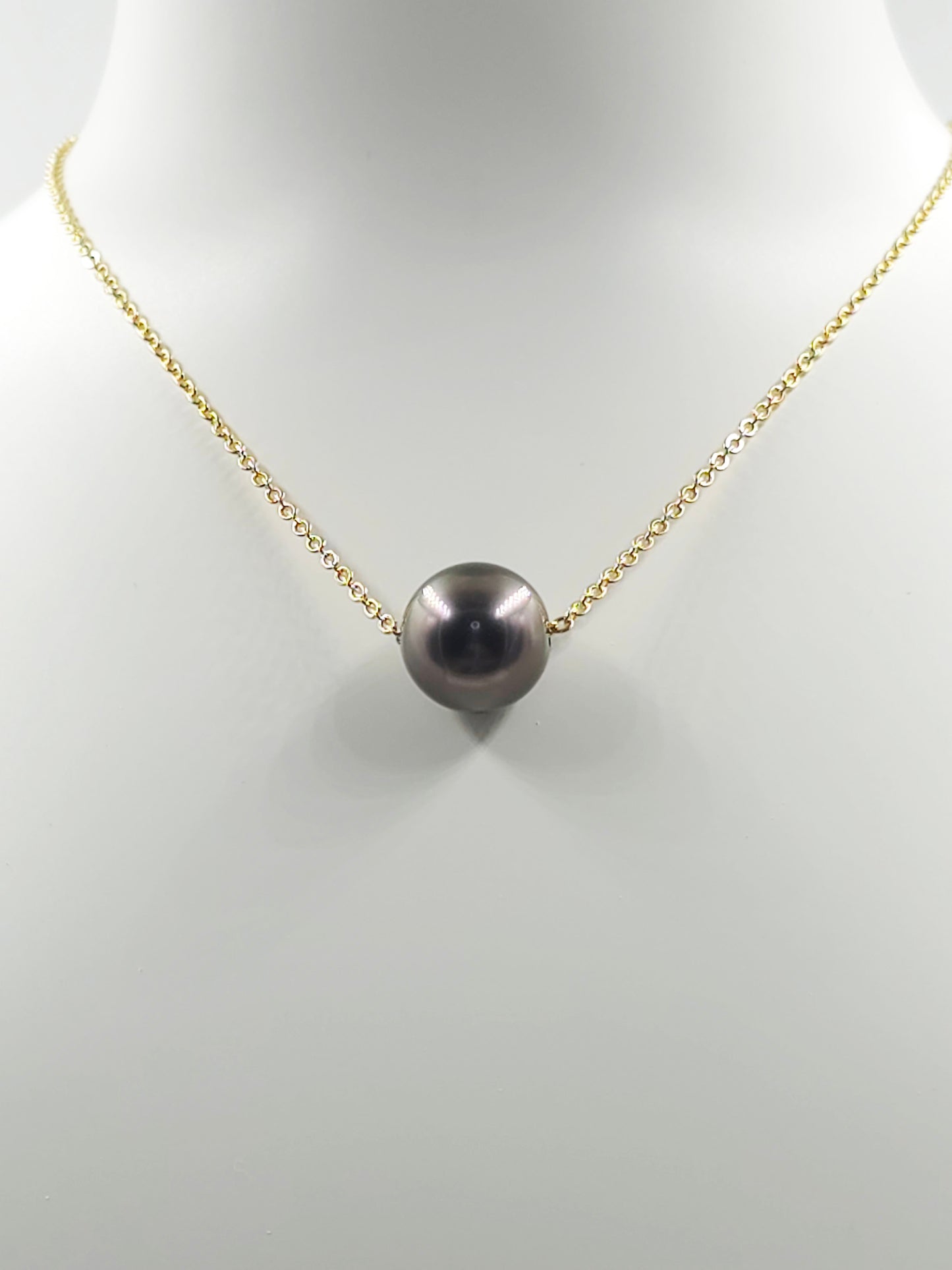 Collier flottant en plaqué or 14 carats — « Le Flotteur »