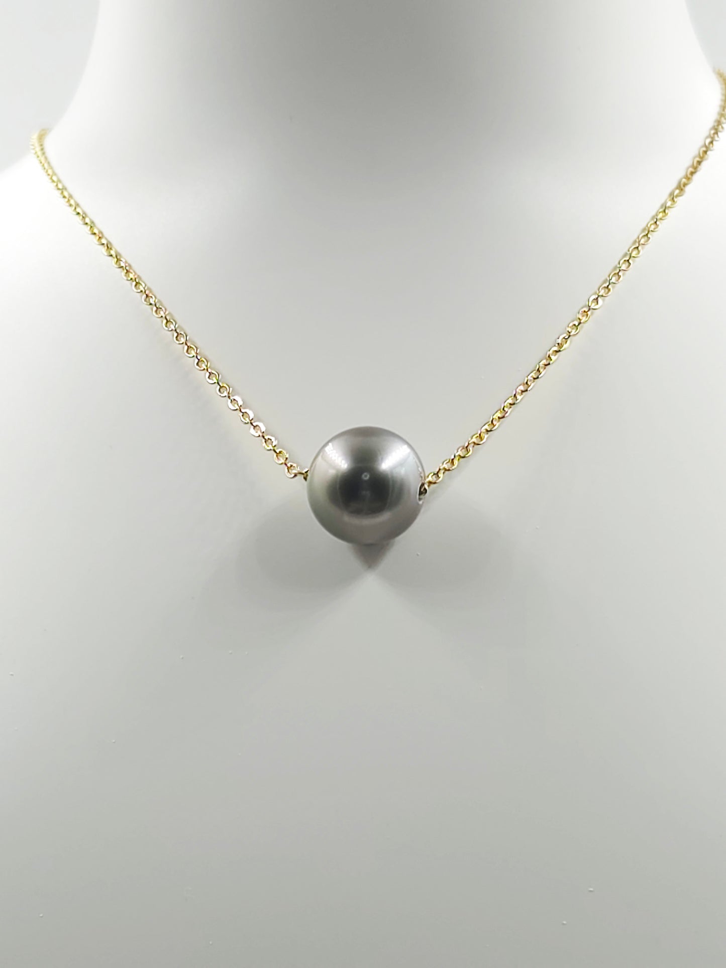 Collier flottant en plaqué or 14 carats — « Le Flotteur »