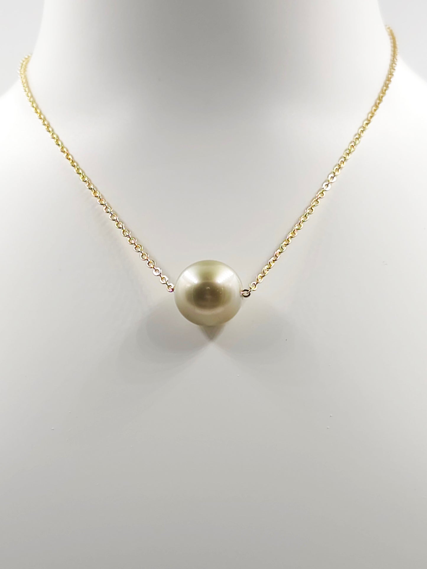 Collier flottant en plaqué or 14 carats — « Le Flotteur »