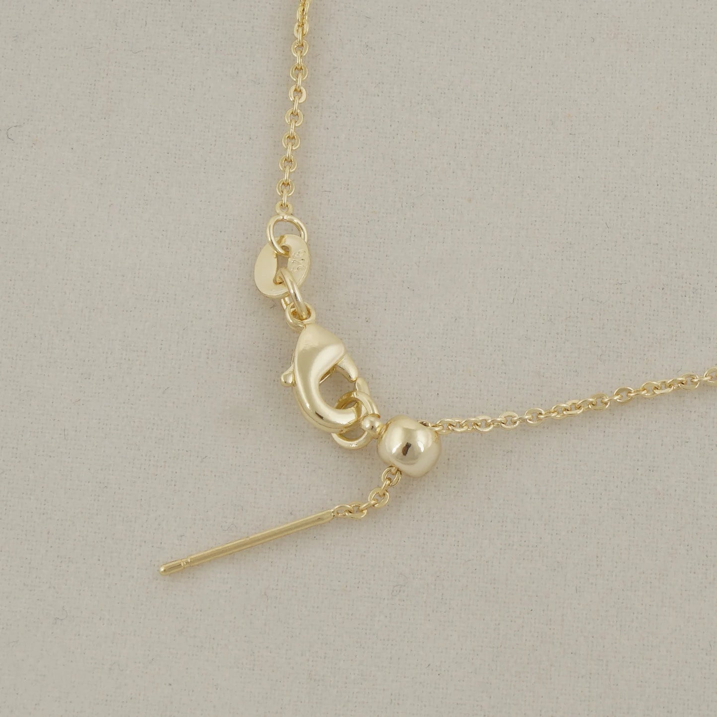 Collier flottant en plaqué or 14 carats — « Le Flotteur »